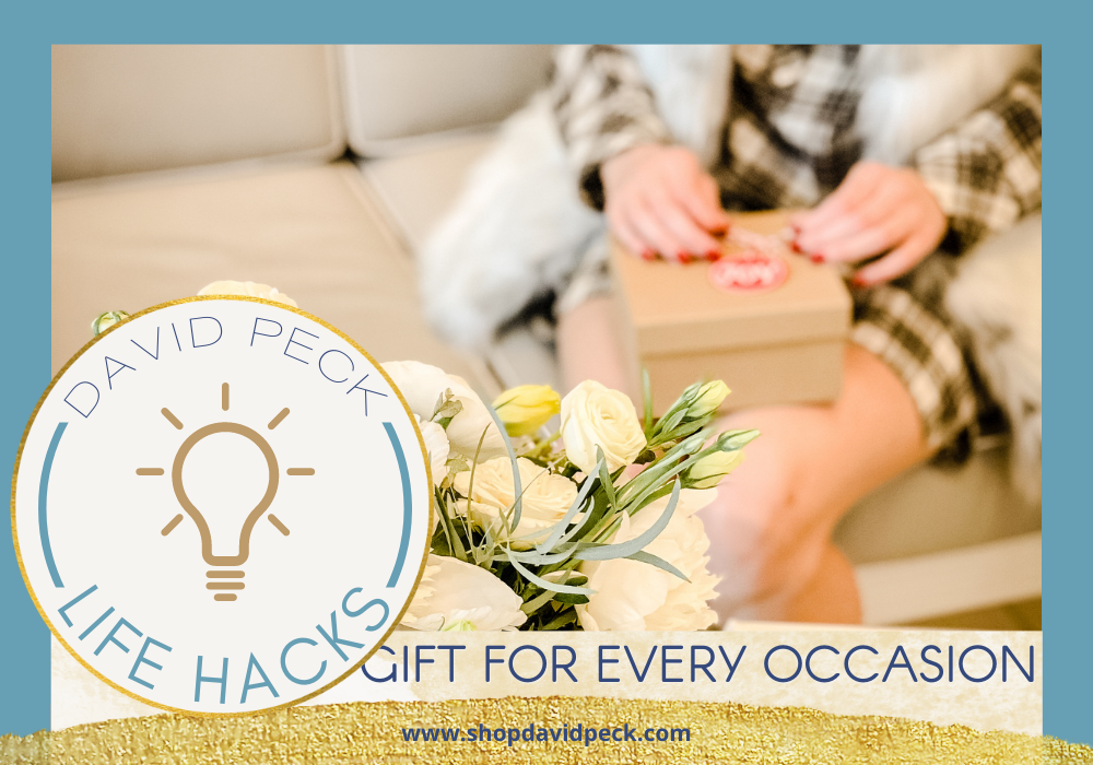life hack.girl with red nails sitting on couch holding a gift.
