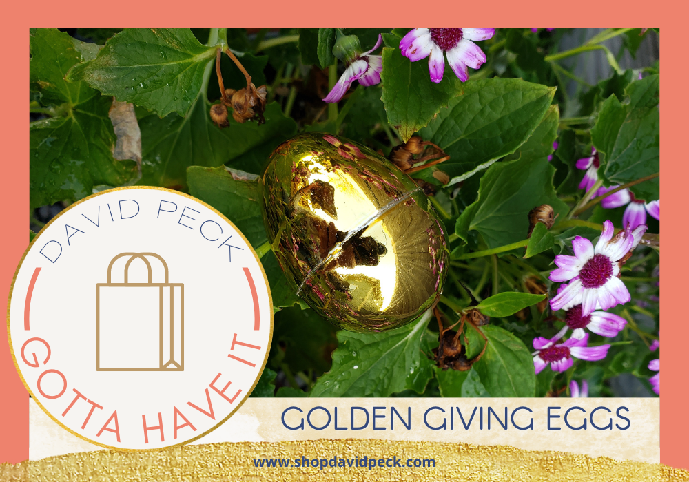 Gotta Have It. Green grass nest with white daisies and golden eggs in the middle