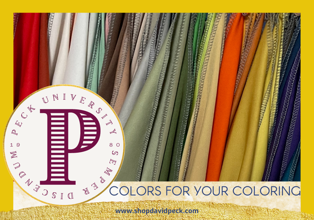 PeckU. Fabric color swatches hanging in autumn colors. House of Colours swatches in yellow, green, white, brown, and orange.