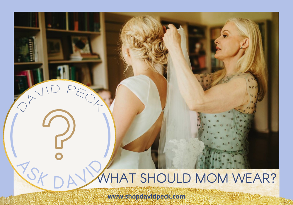 Ask David. blonde mother of the bride putting on blonde bride's vail.