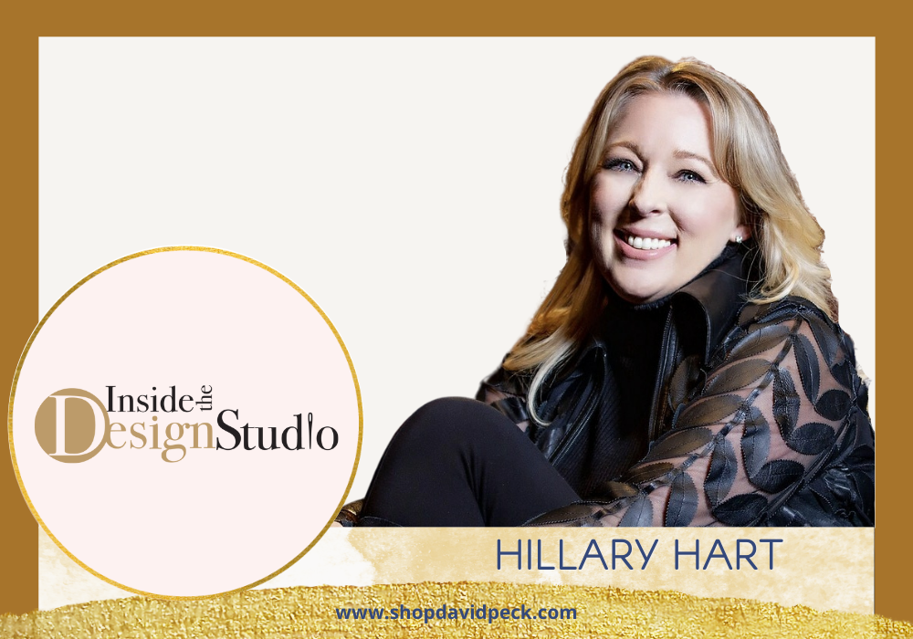Inside the Design Studio. Headshot of smiling blonde woman in black detailed blouse in front of white background.