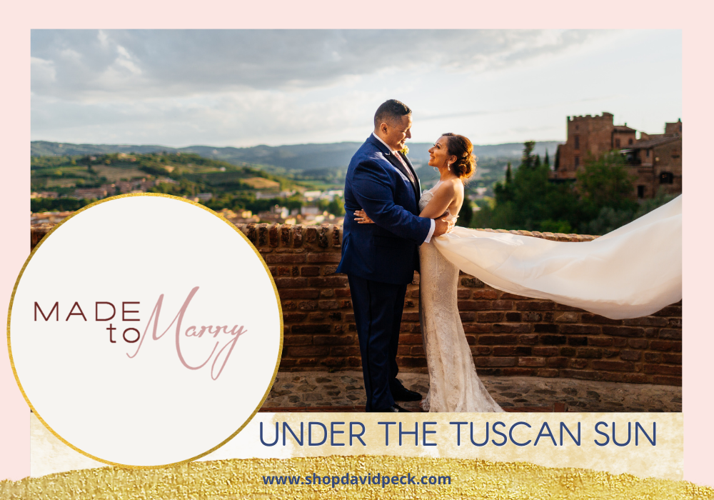 Made to Marry. Brunette bride and groom staring at each other in front of brick wall and view of city of Tuscany.