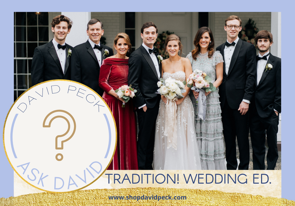 ask david. family wedding photo. five men and three woman all in black tie attire