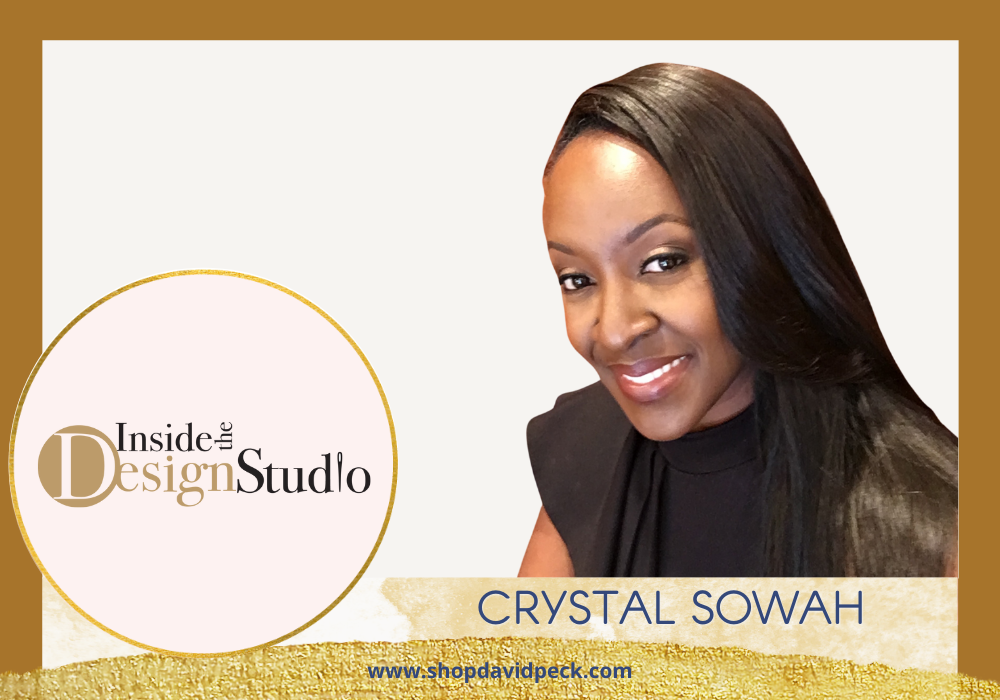 Inside the Design Studio. African American woman in black blouse smiling.