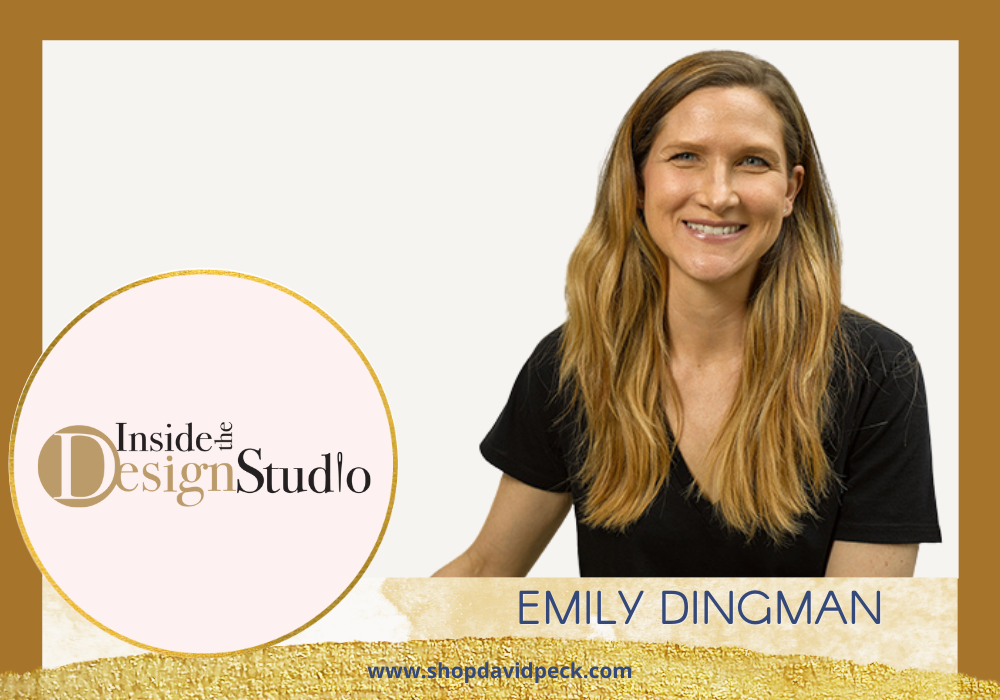 Inside the Design Studio. Dirty blonde woman in black vneck tee.