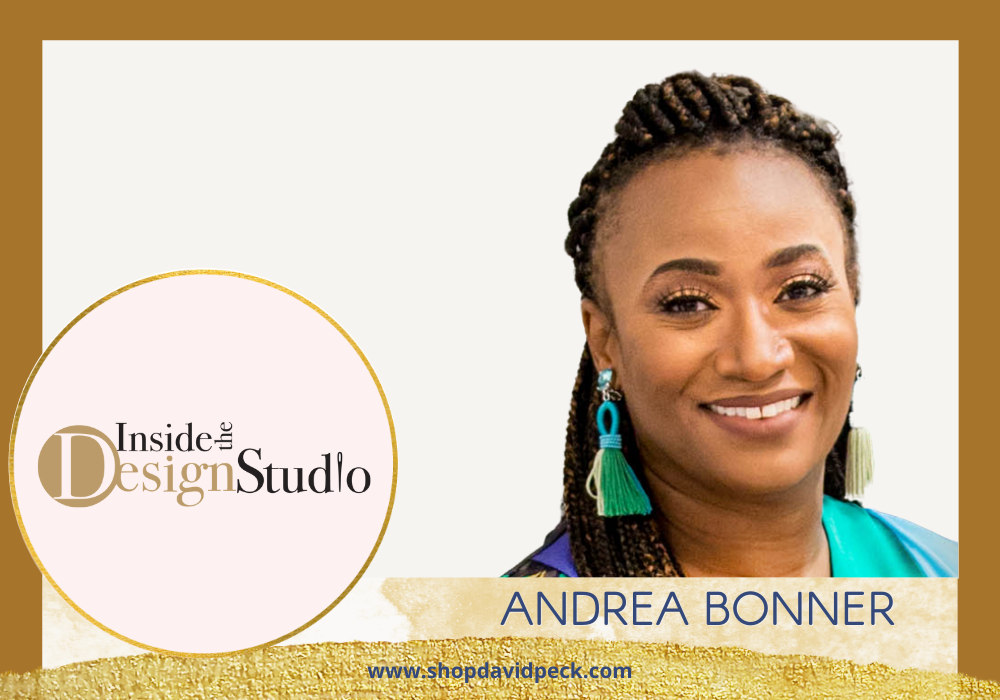  Inside the Design Studio. Smiling African American woman wearing turquoise jewelry and a blouse in front of white background.