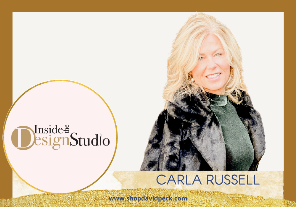 Inside the Design Studio.Blonde woman in emerald green dress with faux black fur coat.