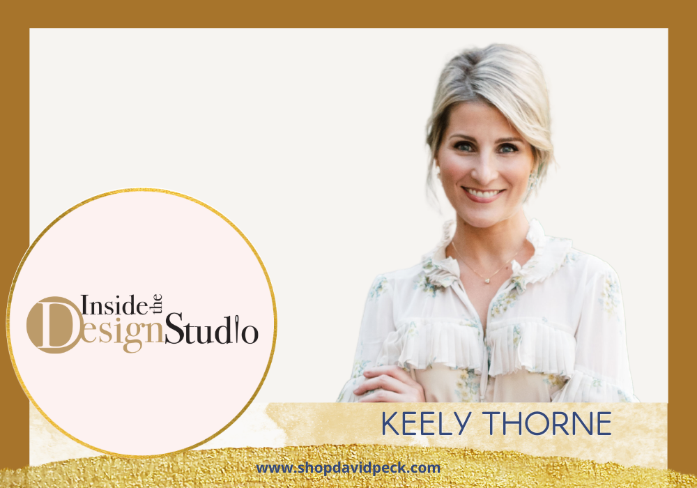 Inside the Design Studio. blonde woman with up-do smiling in white attire with greenery.