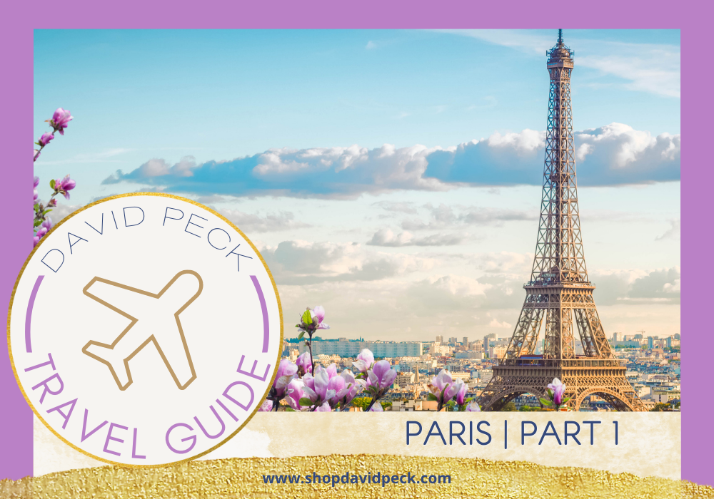 travel guide.Paris travel guide by David Peck. picture of the Eiffel tower in spring with cherry blossoms with a beautiful blue sky