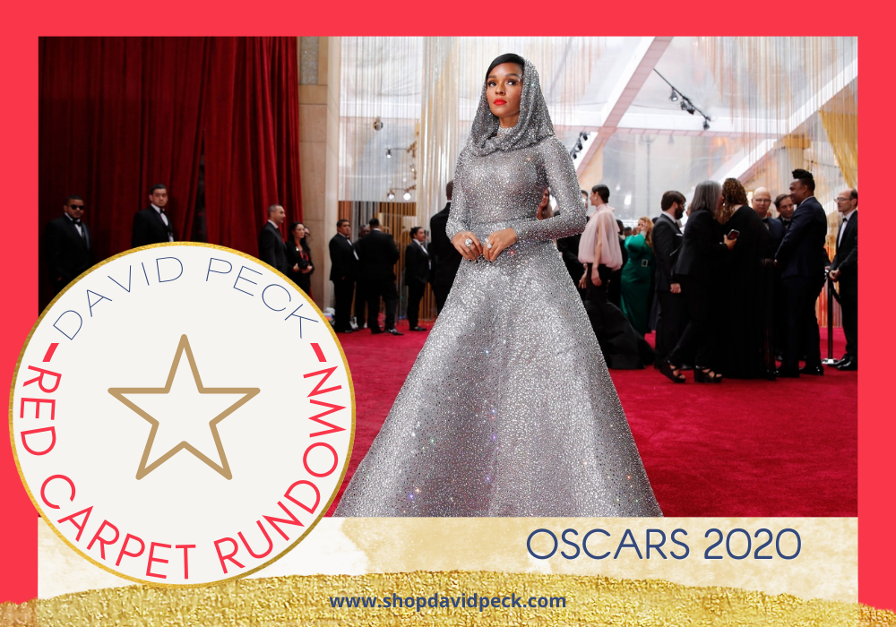 Red Carpet Rundwon. Monáe Washington Post wearing a silver gown and red lip on red carpet at the 2020 Oscars. 