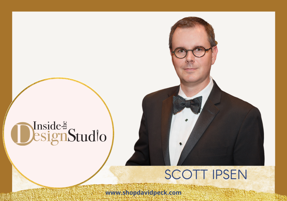 Inside the Design Studio. Headshot of a brunette man with glasses wearing a tux.