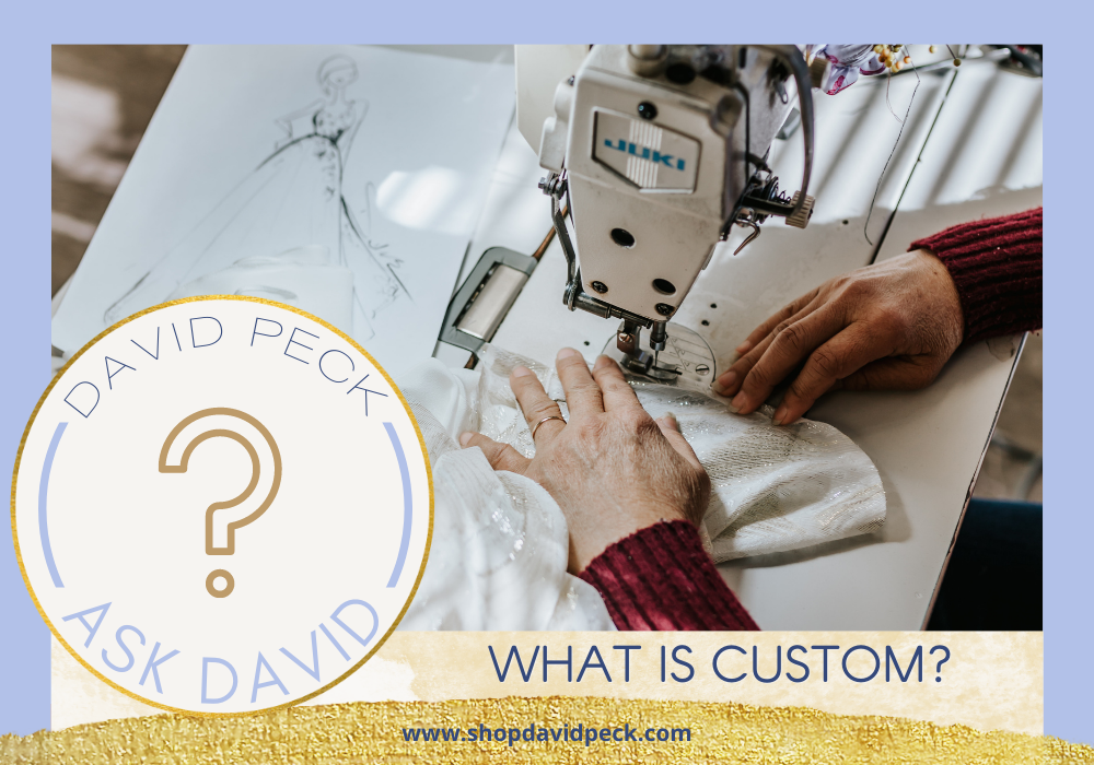 ask david. David Peck answers your questions. This blog is about the custom gown design process. woman's hands feeding white fabric through a sewing machine with the sketches of the garment in front of her.