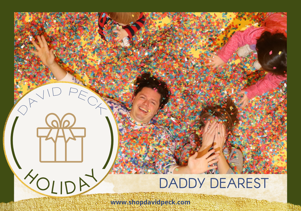 Holiday. David Peck in blue and white sweater with his kids at Color Factory covered in confetti