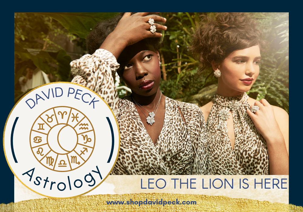 Leo the Lion is here for Leo season. Two models wearing animal print and cheatah print gowns and Van Cleef and Arpels fine jewelry.