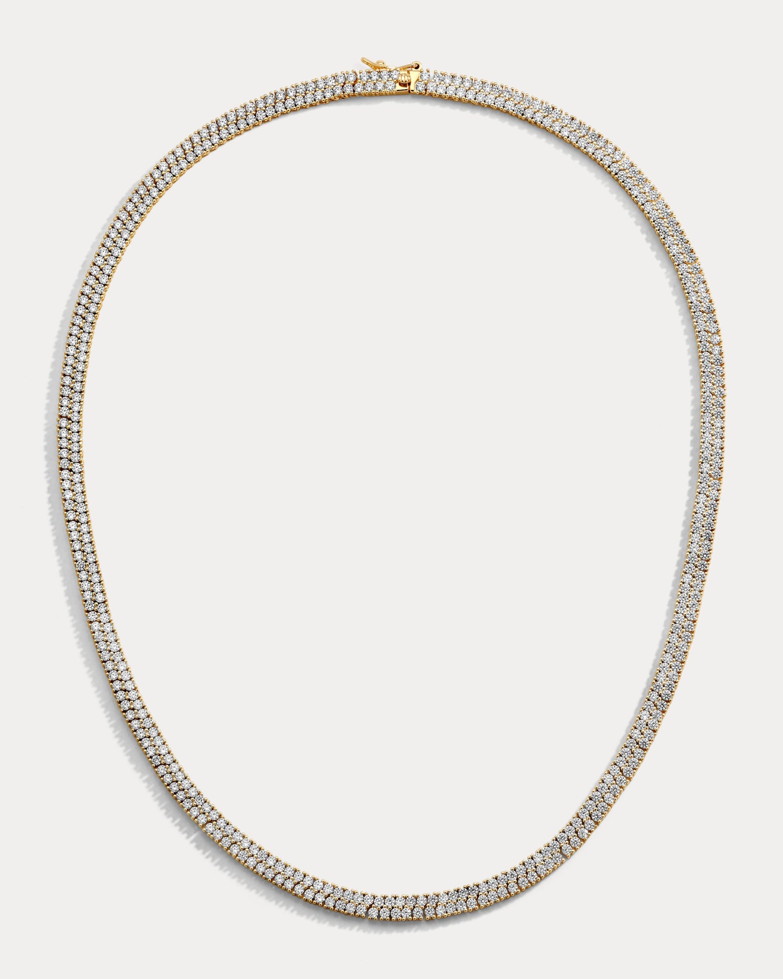 Diamante necklace on a light gray background