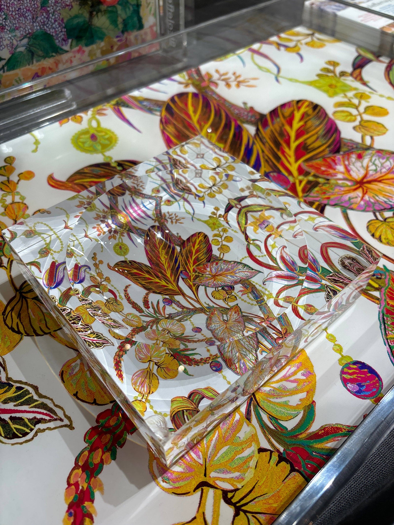 Colorful floral patterned paper on a white background