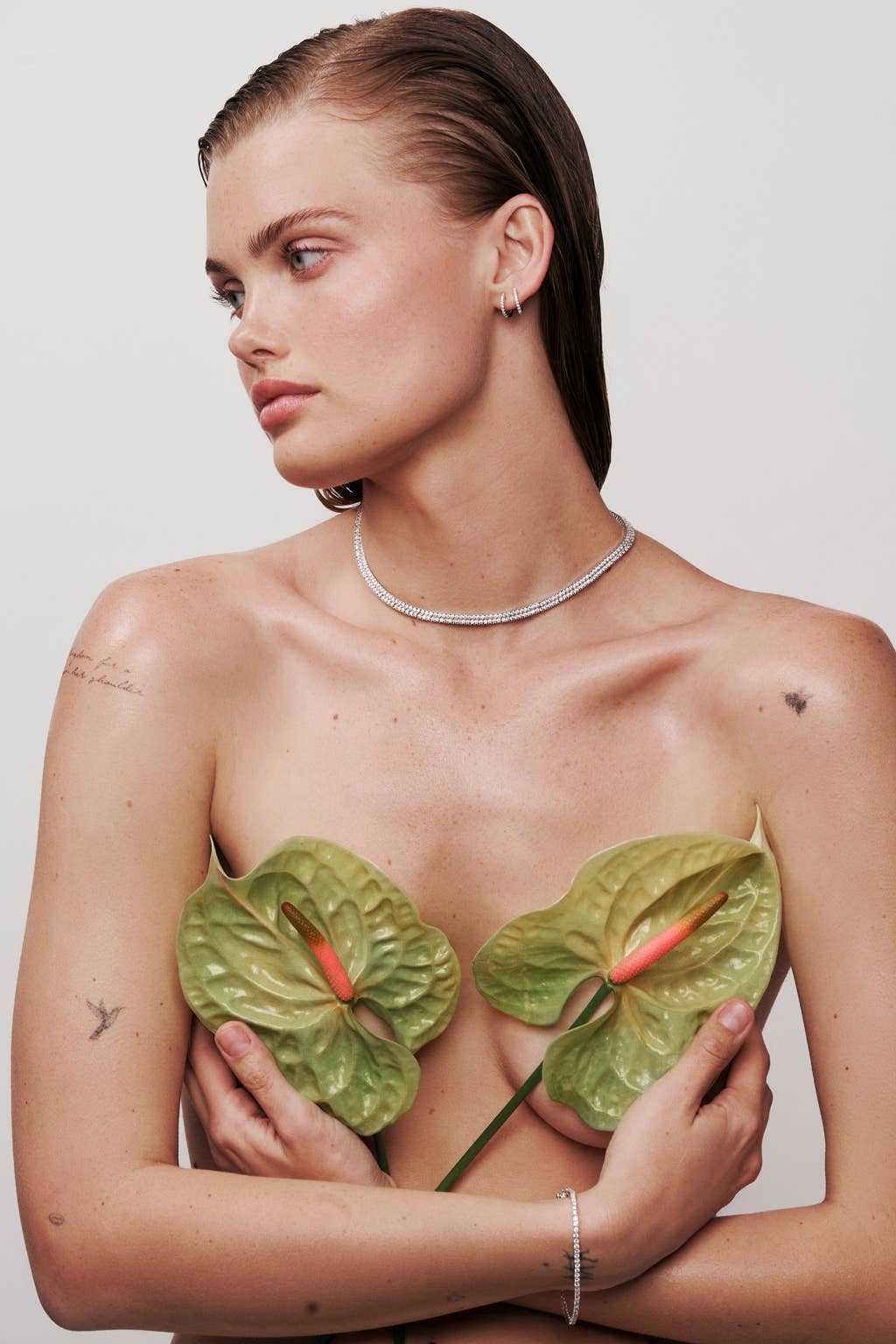 Diamante necklace on a light gray background