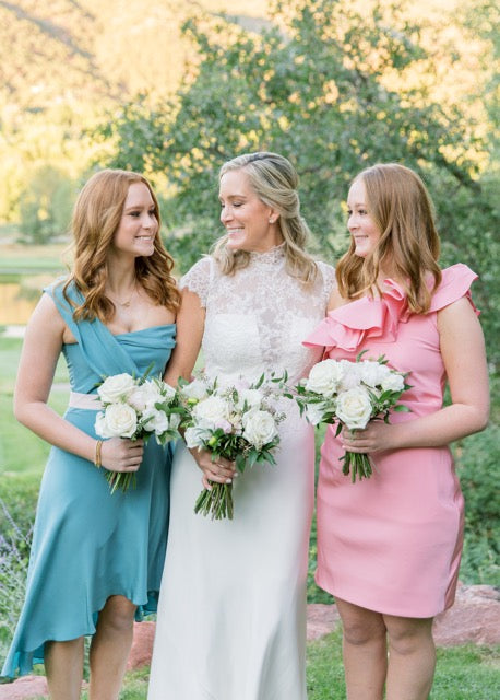 Amy LeCrone Mitchell at her Aspen Basalt Wedding in the mountains of Coloarado in a custom designed short sleeve lace wedding gown by David Peck.